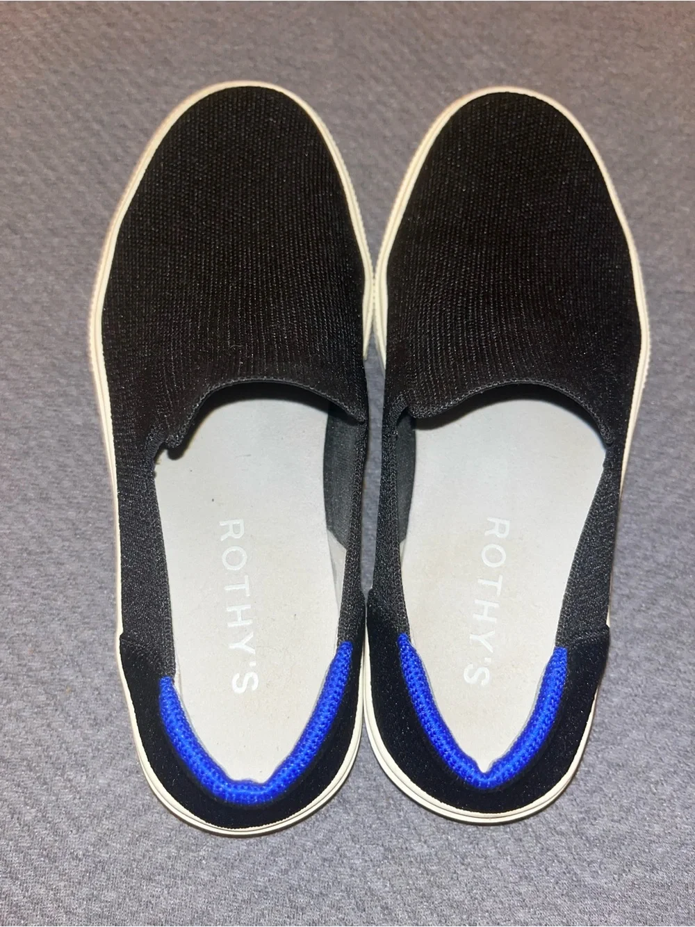 EUC Rothy's The Original Slip-On Sneakers in black. Size 9